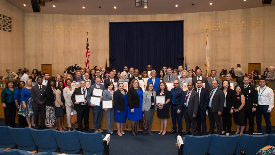 Group picture of Board Scroll presentation for NACo