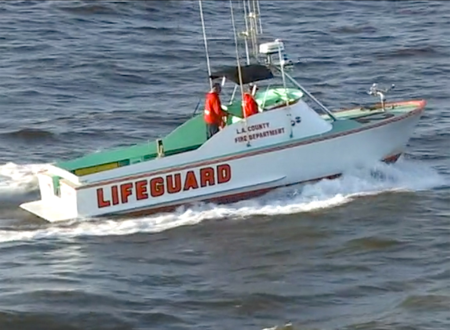 Image of a lifeguard boat in the water.